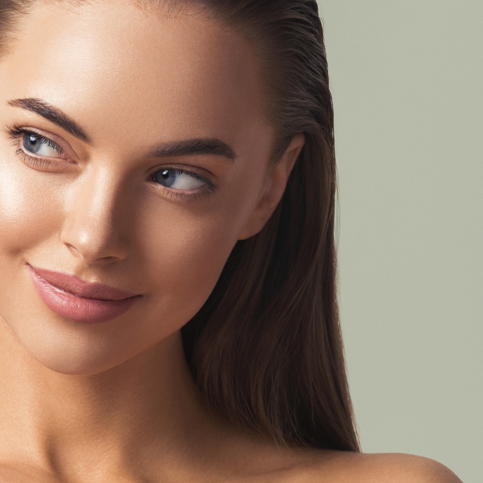 Woman face beautiul eyes nose clean tanned skin cute happy smile beauty female