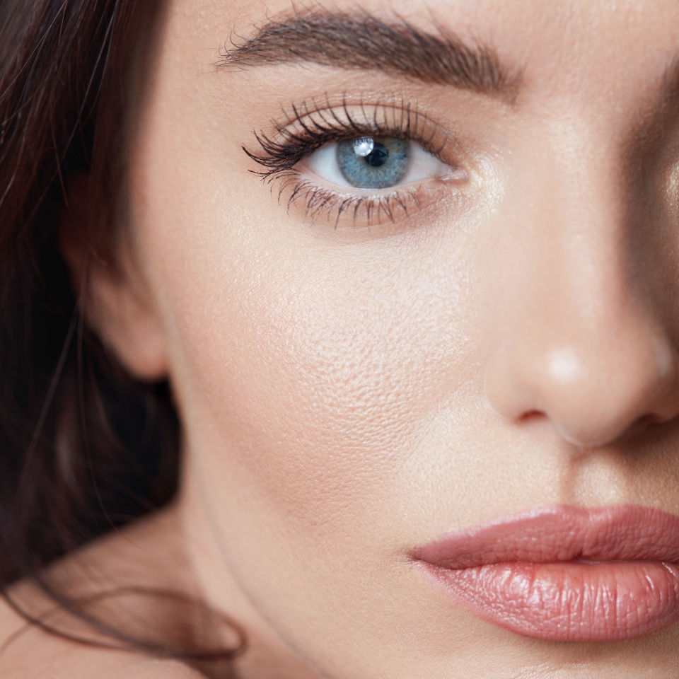 Beauty. Young Woman Close Up Portrait. Blue-Eyed Brunette With Perfect Skin. Beautiful Girl With Natural Daily Makeup.