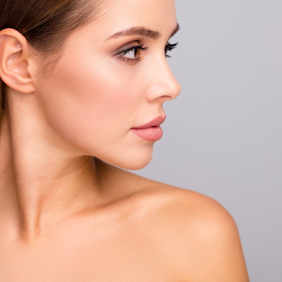 Closeup profile photo of attractive beautiful lady nude shoulders plump perfect shape lips ideal tempting appearance look side empty space isolated grey color background