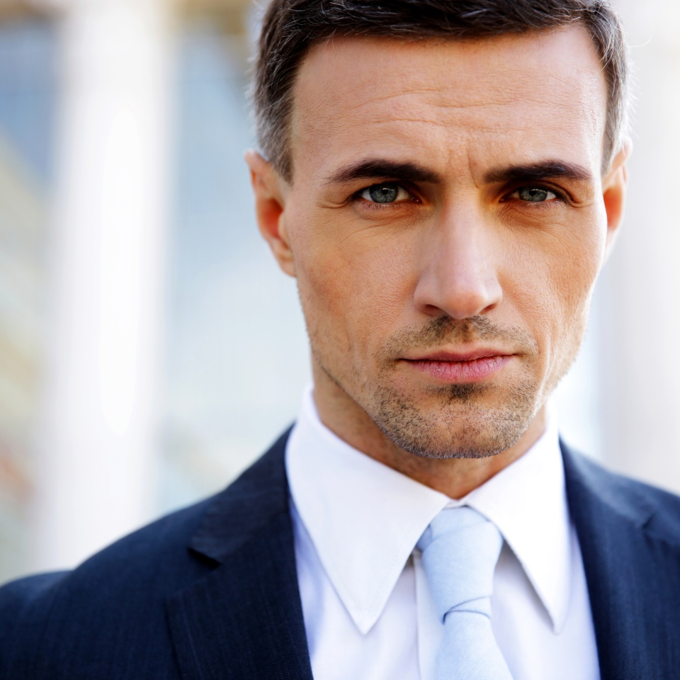 Portrait of a confident businessman looking at camera