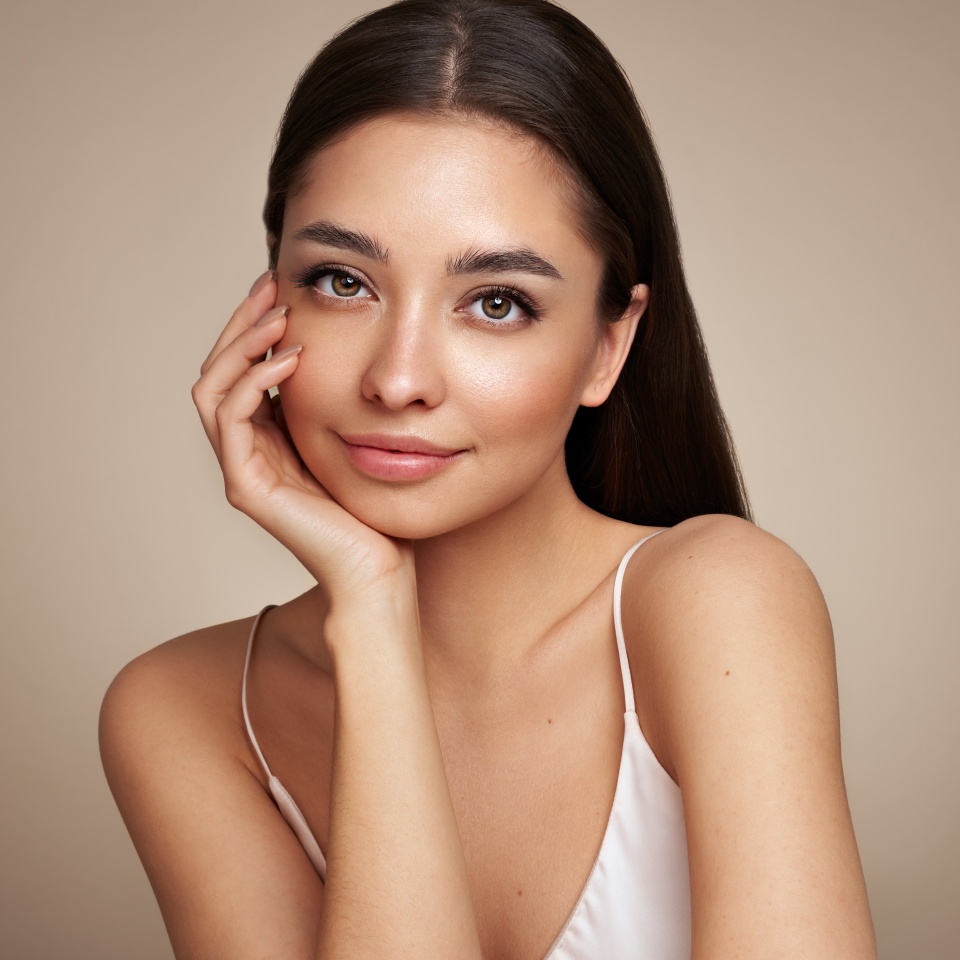 Portrait beautiful young woman with clean fresh skin. Model with healthy skin, close up portrait. Cosmetology, beauty and spa