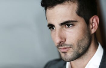 Portrait of handsome man on dark background