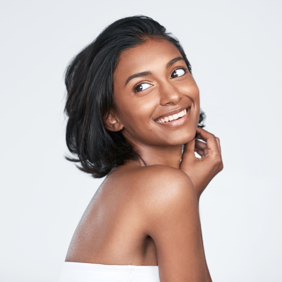 W e all want to look our best with minimal effort. Shot of a beautiful young woman posing against a white background.